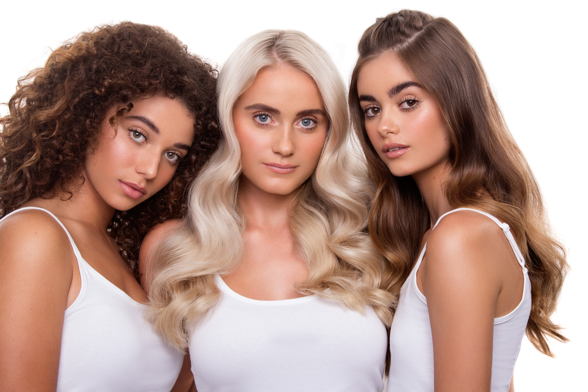 3 people with lash lifts in white shirts